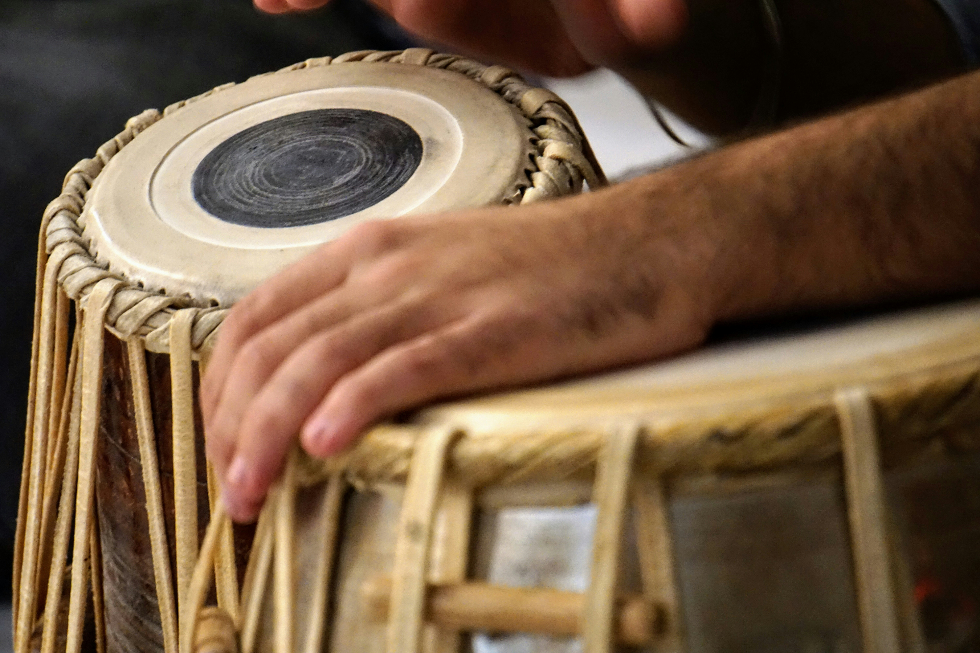 Hands playing tabla percussion